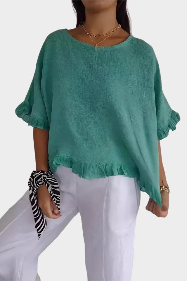 Delicate linen top with ruffles and gathering