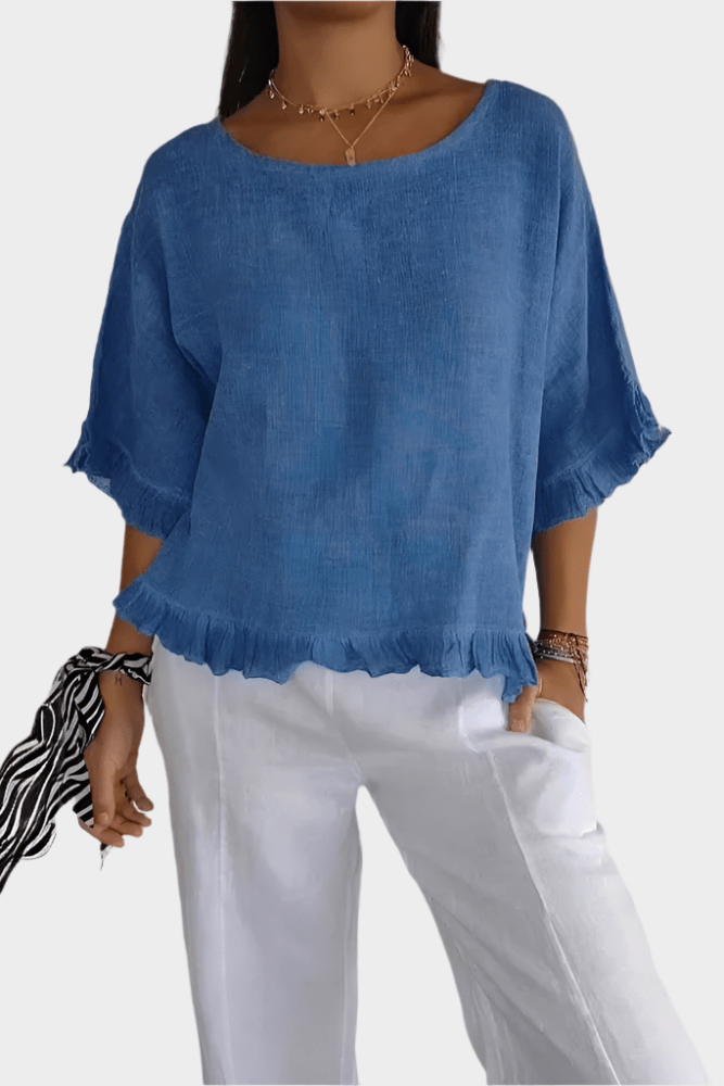 Delicate linen top with ruffles and gathering