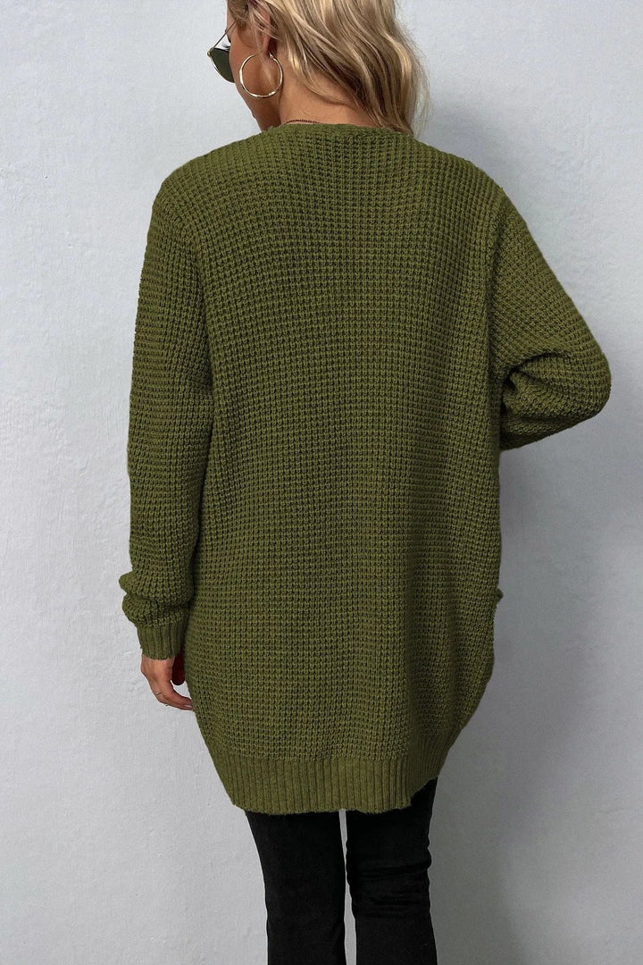 Różowy sweter z otwartym przodem