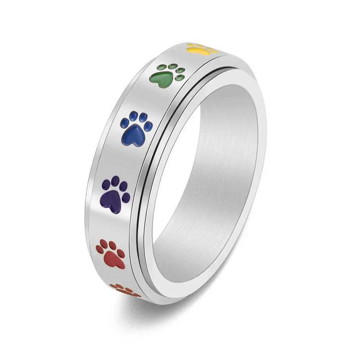 Rotating stress relief ring for paws