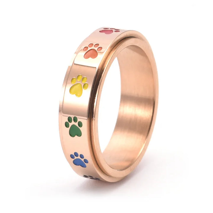 Rotating stress relief ring for paws