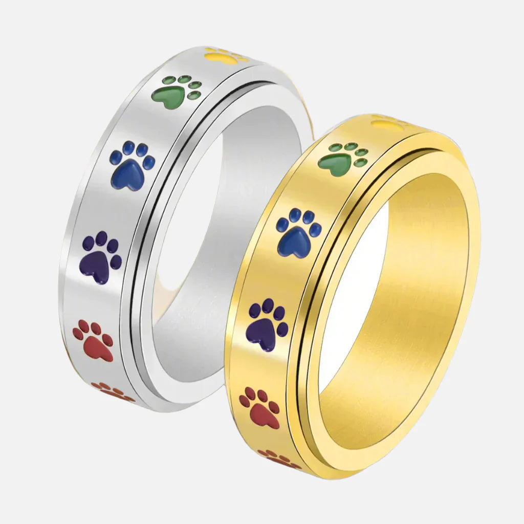 Rotating stress relief ring for paws