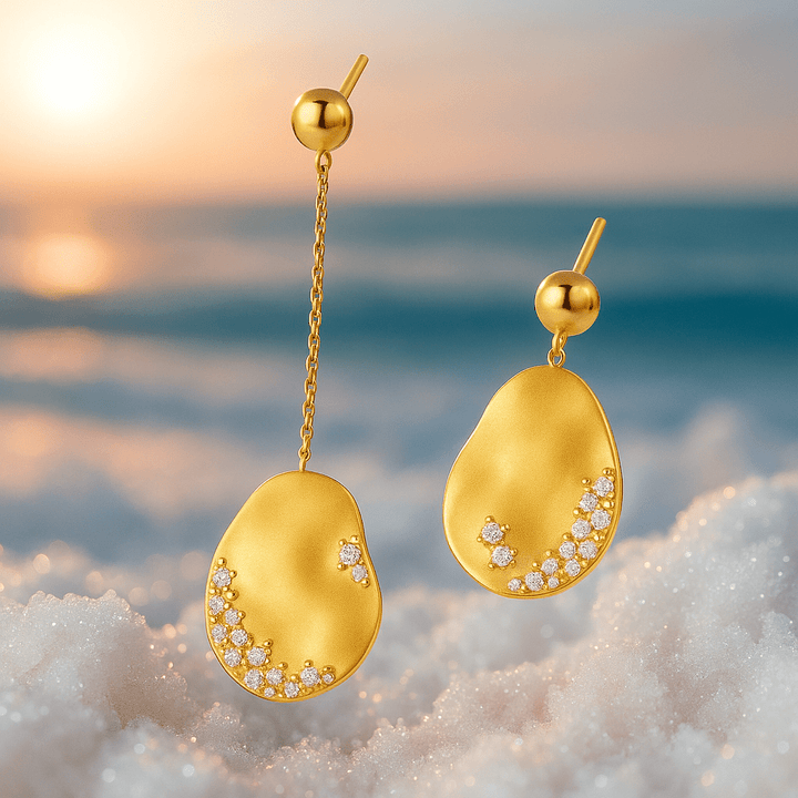 Gold teardrop earrings with crystals